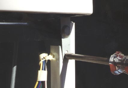 Position tabs on top of cabinet