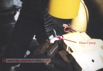 Reattach tub drain hose.